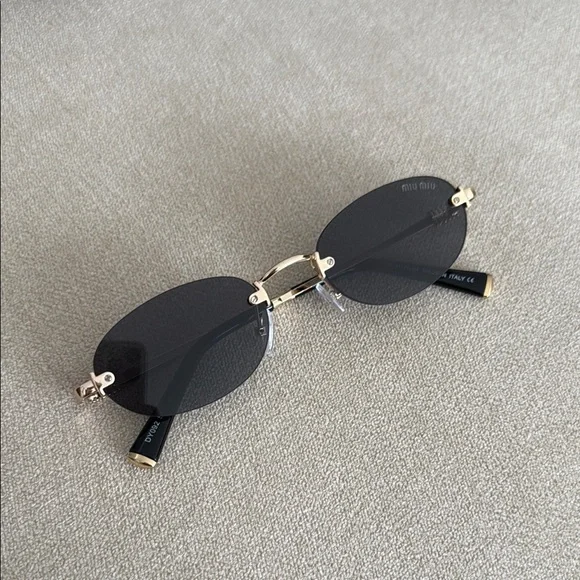 Miu Miu Black Oval Sunglasses - Picture 2 of 6